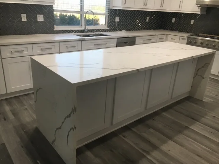 Luxury kitchen with granite island and custom lighting